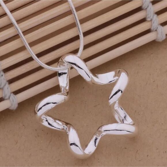 unbranded Jewelry - Sleek Snake Chain Twisted Star Pendant stamped .925 Sterling Silver Necklace